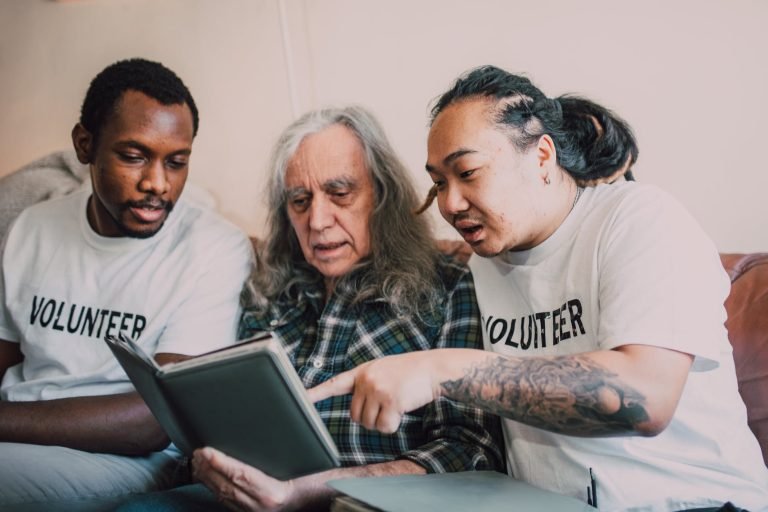 men looking at a photo album together